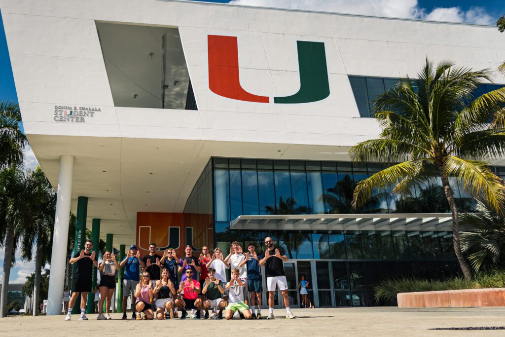 Florida Tennis Roadtrip tennis camp participants in front of the University of Miami Student Center